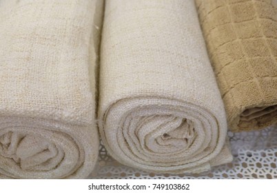 Hygiene Concept, Rolled Up White and Brown Terry or Cotton Bath Towels Used for Drying or Wiping A Body.