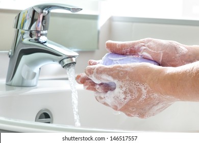 Hygiene concept. Washing hands with soap