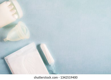 Hygiene Items For Womens Critical Days, Such As Pad, Menstrual Cup, Tampon. Top View, Flat Lay, Concept Of Womens Health Issues