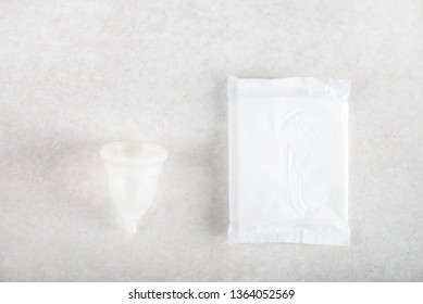 Hygiene Items For Womens Critical Days, Such As Pad And Menstrual Cup. Top View, Flat Lay, Concept Of Womens Health Issues