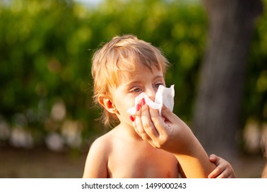 Hygiene - Mom Wiping The Baby Nose And Face With Wet Wipes. Cleaning Wipe, Pure, Clean, Outdoor