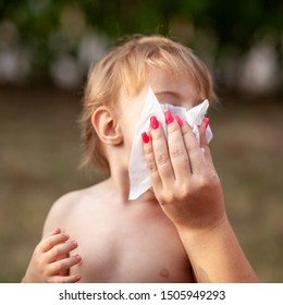 Hygiene - Mom Wiping The Baby Nose And Face With Wet Wipes. Cleaning Wipe, Pure, Clean, Outdoor