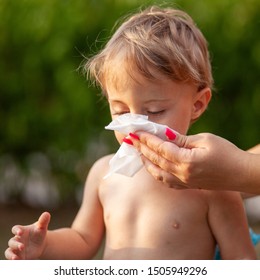 Hygiene - Mom Wiping The Baby Nose And Face With Wet Wipes. Cleaning Wipe, Pure, Clean, Outdoor