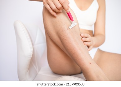 Hygiene Skin Body Care Concept. Hair Removal. Closeup Woman Shaving Legs With Razor Blade. After Shaving Legs Irritation With Razor. 