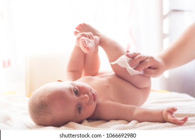 Hygiene - Young Mom Wiping The Baby Skin With Wet Wipes Carefully. Cleaning Wipe, Pure, Clean