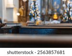 Hymnal and bible on a pew in a church