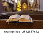 Hymnal and bible on a pew in a church