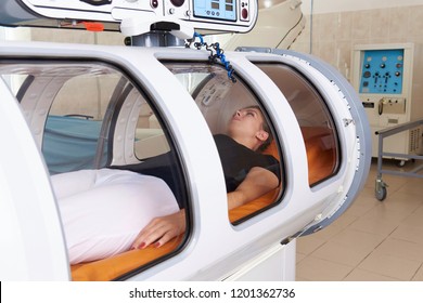 Hyperbaric oxygen chamber in a hospital. - Shutterstock ID 1201362736