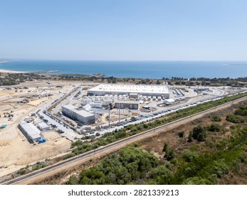 Hyperscale data center facility and adjacent construction site near the coast in Portugal. 
