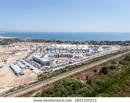 Hyperscale data center facility and adjacent construction site near the coast in Portugal. 