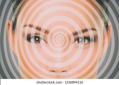 Hypnosis hypnotize spiral over woman face for mind control.