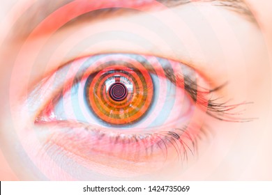 Hypnosis Spiral in eye - Woman with vertigo - Shutterstock ID 1424735069