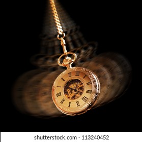 Hypnotism Concept, Gold Pocket Watch Swinging Used In Hypnosis Treatment