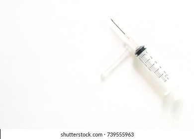 Hypodermic Needle On White Background.