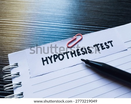 Hypothesis test writting on table background. 