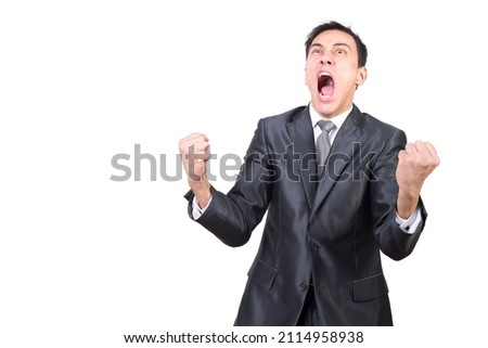 Hysterical man in formal suit shouting in studio