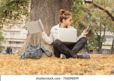 Hysterical Young Girl With Too Many Screens, Mobile Phones, Tablets And Laptops. Too Much Communications Concept. Internet Social Media. Emotional Isolation And Technology Depresion