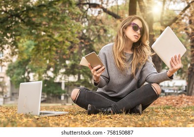 Hysterical Young Girl With Too Many Screens, Mobile Phones, Tablets And Laptops. Too Much Communications Concept. Internet Social Media. Emotional Isolation And Technology Depresion