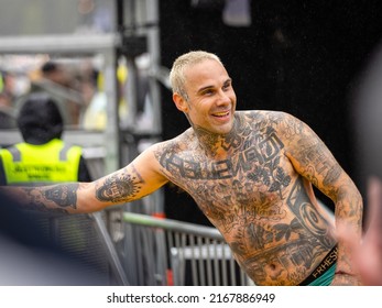 HYVINKAA, FINLAND – JUNE 2 2022: Jason Aalon Butler Of The American Rock Band Fever 333 Greeting Fans In The Pouring Rain At Rockfest Music Festival