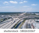 I10 Interstate Highway Crossing in Houston - Blue Skies - Aerial View of Infrastructure