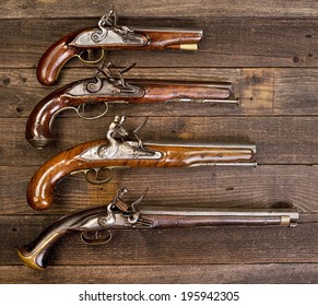I8th Century flintlock pistols.