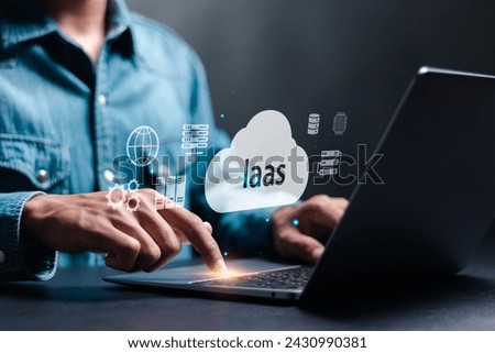 IaaS, Infrastructure as a service cloud computing service concept. Person using laptop with cloud icon and iaas word on virtual screen. 