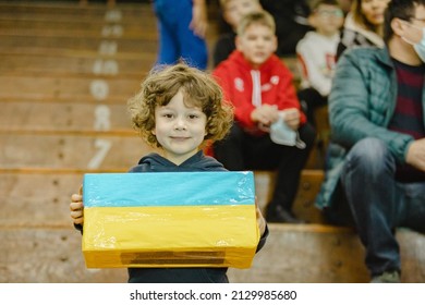 Iasi, Romania - February 27 2022 : During a basketball game in Romanian second league, donations were raised to support Ukrainian refugees.