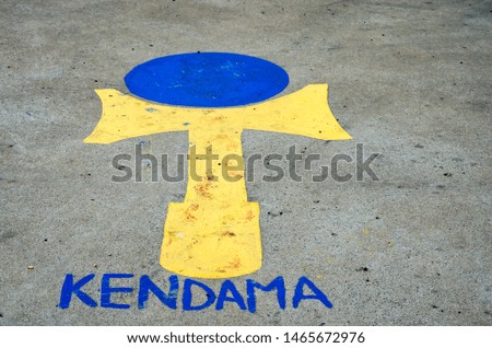Iasi-Romania- July 12-2019- Kendama   traditional Japanese skill toy painted  sign on ground  in park .