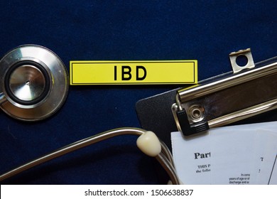 IBD text on sticky notes and stethoscope isolated on office desk. Heathcare/medical concept
