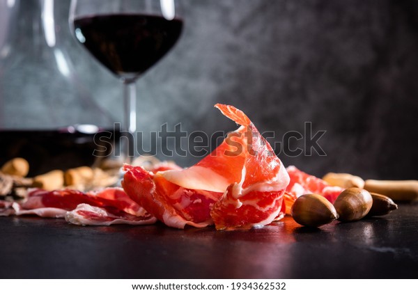 Iberian Ham. acorn-fed Iberian ham. Iberian ham with\
a glass of wine
