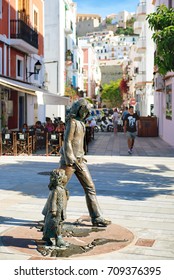 Ibiza, Spain - June 10, 2017: Bronze Sculpture Honours Hippie Culture In Ibiza Town. The Sculpture Is The Work Of Catalan Sculptor Cio Abelli