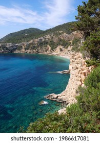 Ibiza, Spain; June 5 2021: View of beach, sea, forest and town in Ibiza