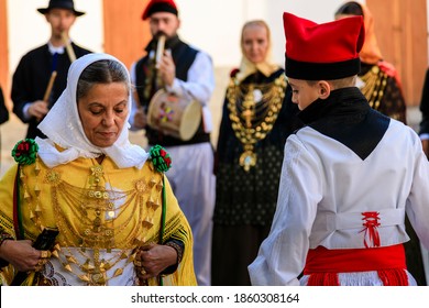 Ibiza Town, Ibiza / Spain - 11 04 18: Selective Focus On An Active Older Woman And Young Boy, Part Of A Folklore Group, Dancing In Traditional Dress At A Celebration Of Spanish And Balearic Culture