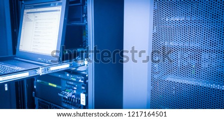 IBM server mount on rack in data center 