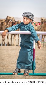 Ibri, Oman, 28th April 2018: Omani Kid At A Camel Race In A Countryside