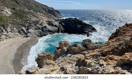 Icaria Island Beach In Greece During The Summer. Sandy. Rocks. Sea. Waves