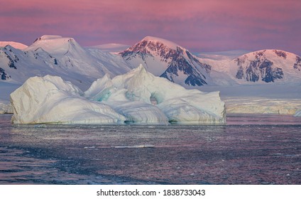 Ice Bergs At Sunset In Antartica