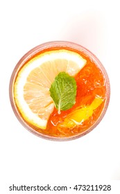 Ice Black Tea With Lemon Slice Isolated On White Background; Overhead Shot