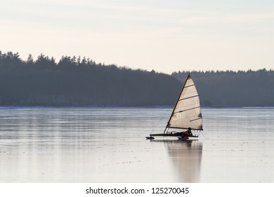 Ice Boat On Frozen Water