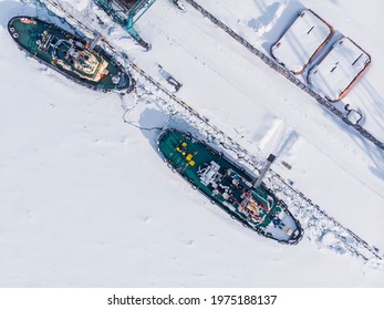 Ice Bound Ships Froze In Snow In Winter, Waiting For Breaker, Aerial Top View.