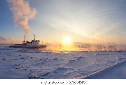 Ice Breaker Breaks Ice At Sunset.