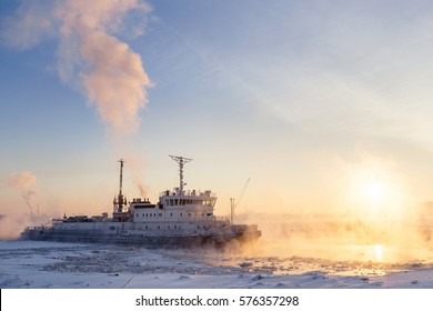 Ice Breaker Breaks Ice At Sunset.