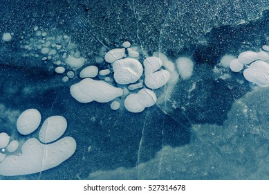 Ice Bubbles On Frozen Lake. 