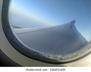 Ice Build Up In A Airplane Window