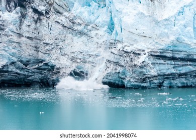 Ice calving on the Margerie Glacier terminus into the waters of the Tarr Inlet, Glacier Bay National Park, Alaska