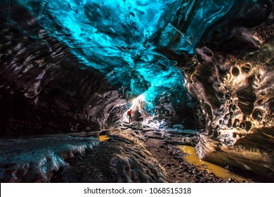 Ice Cave In Vatnajokull, Iceland.The Beauty Of The Caves Filled With Blue Ice.