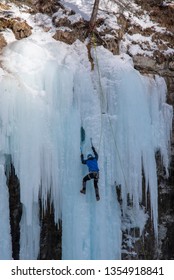 Ice Climbing In Johnston Canyon, Alberta, Canada.