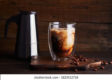 Ice coffee in a double-walled glass