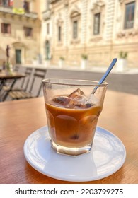 ice coffee, glass of cold iced coffee known as “leccese” in Lecce, salento region of Italy. traditional cold drink or beverage of Lecce in Italy. selective focus on glass with noise effects. - Shutterstock ID 2203799275