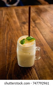 Ice Coffee And Juice On Wooden Background